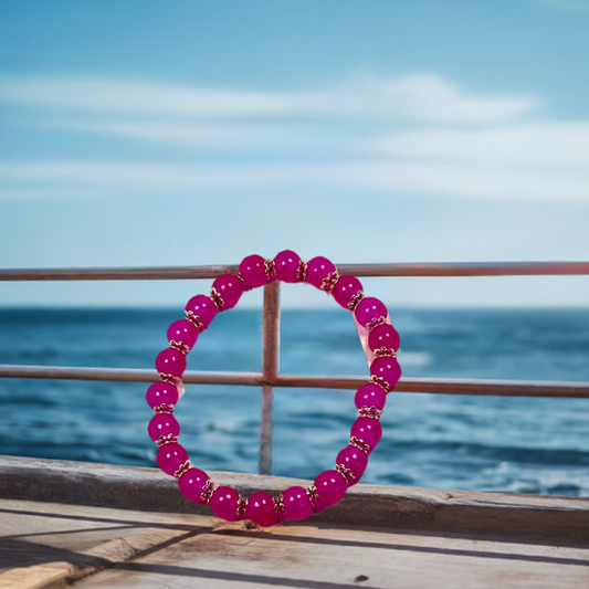 Beautiful fuschia glass bead bracelet with caps 8mm